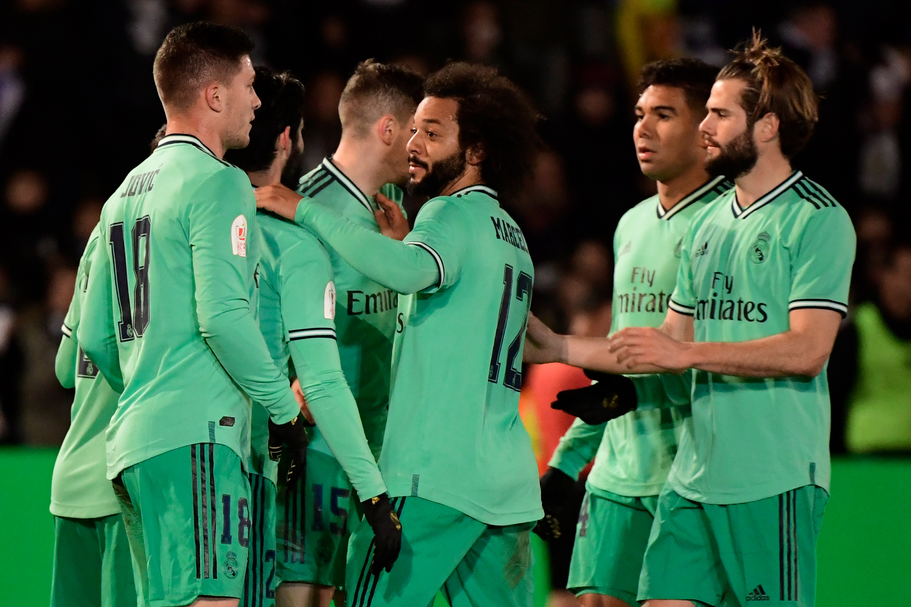 Real Madrid's players celebrate Spanish midfielder Brahim Diaz's goal during the Copa del Rey (King's Cup) football match between Unionistas de Salamanca CF and Real Madrid CF at Las Pistas del Helmantico stadium in Salamanca, on January 22, 2020. (Photo by JAVIER SORIANO / AFP) (Photo by JAVIER SORIANO/AFP via Getty Images)