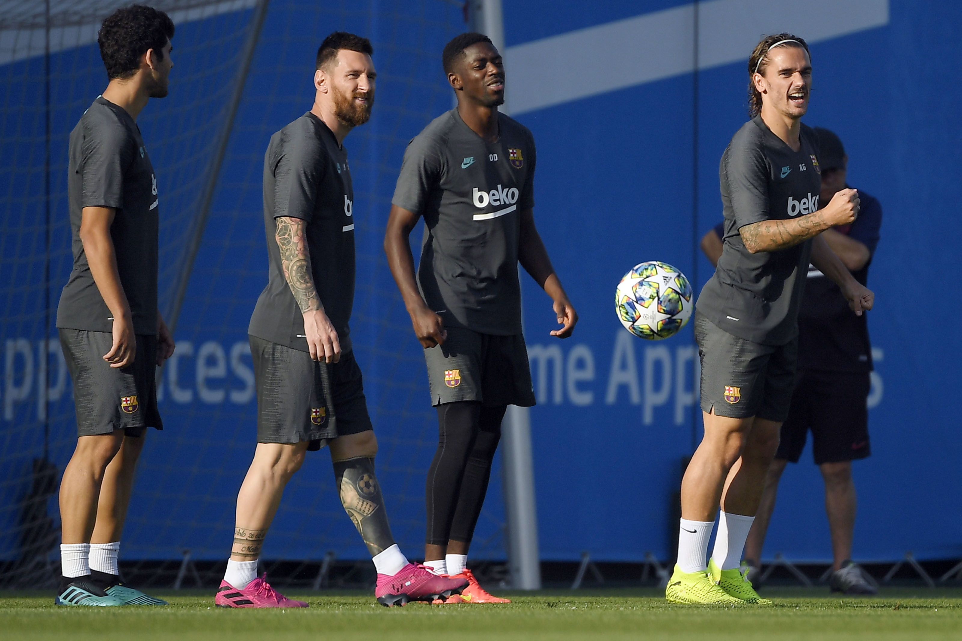 Barcelona's Argentine forward Lionel Messi (2L), Barcelona's French forward Ousmane Dembele (2R) and Barcelona's French forward Antoine Griezmann (R) attend a training session at the Joan Gamper Sports City training ground in Sant Joan Despi, near Barcelona,  on October 1, 2019 on the eve of the UEFA Champions League Group F football match against Inter Milan. (Photo by LLUIS GENE / AFP)        (Photo credit should read LLUIS GENE/AFP via Getty Images)