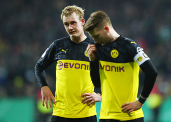 BREMEN, GERMANY - FEBRUARY 04: Julian Brandt and Marco Reus of Borussia Dortmund react during the DFB Cup round of sixteen match between SV Werder Bremen and Borussia Dortmund at Wohninvest Weserstadion on February 04, 2020 in Bremen, Germany. (Photo by Martin Rose/Bongarts/Getty Images)