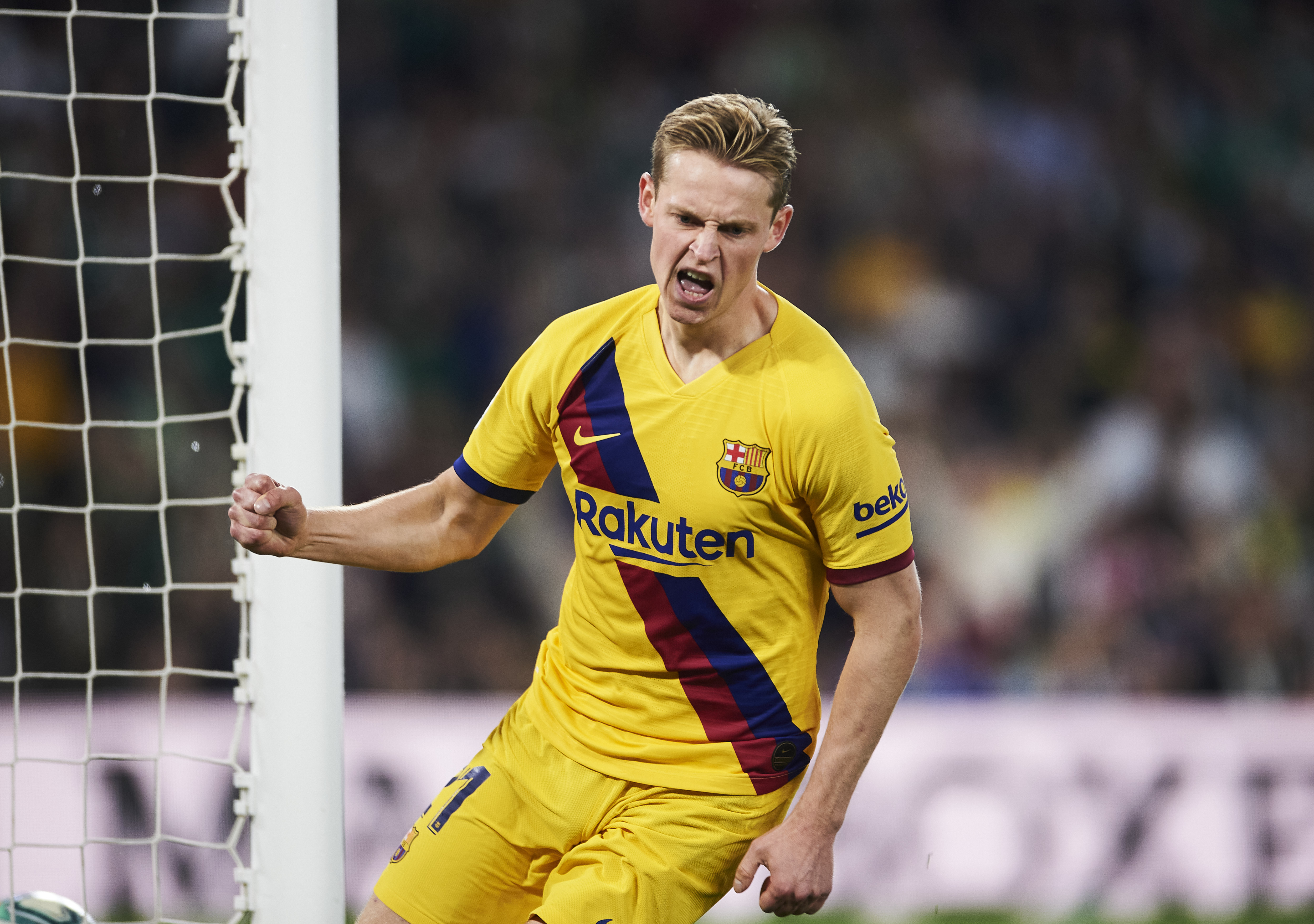 SEVILLE, SPAIN - FEBRUARY 09: Frenkie de Jong of FC Barcelona celebrates after scoring goal during the Liga match between Real Betis Balompie and FC Barcelona at Estadio Benito Villamarin on February 09, 2020 in Seville, Spain. (Photo by Aitor Alcalde/Getty Images)