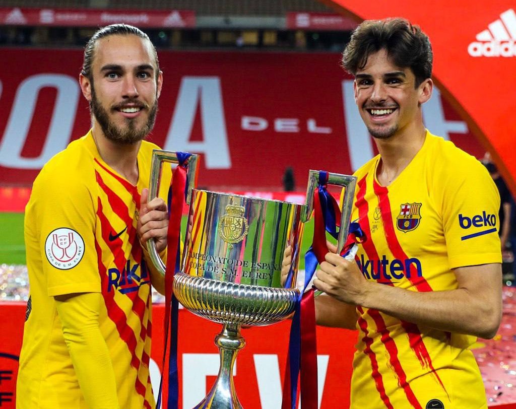 Trincao and Oscar Mingueza with Copa del Rey trophy Credit: FC Barcelona/Twitter